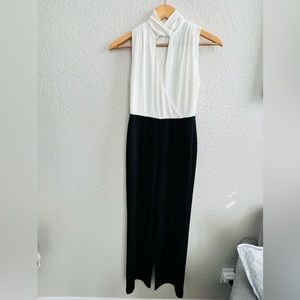 White House/Black Market Ecru/black jumpsuit. New with tags. Size 00P